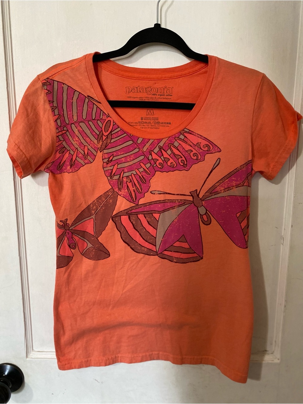 Patagonia Orange Tee with Pink Butterfly Motif